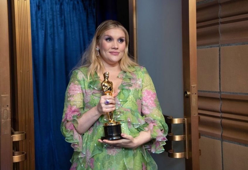 Emerald Fennell poses backstage with the Oscar® for Original Screenplay during the 93rd Annual Academy Awards at Union Station on April 25, 2021 in Los Angeles